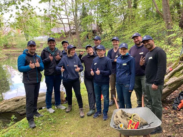 A photo of employees from epay Germany participating in one of their Days of Caring in Spring 2024