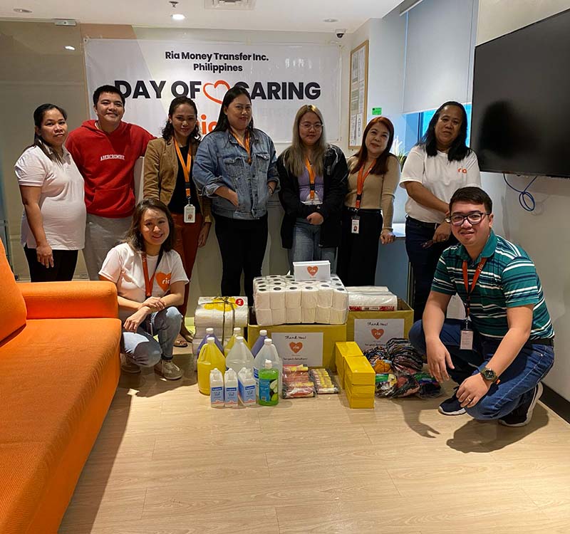 Ria employees donate cleaning products to school in the Philippines.