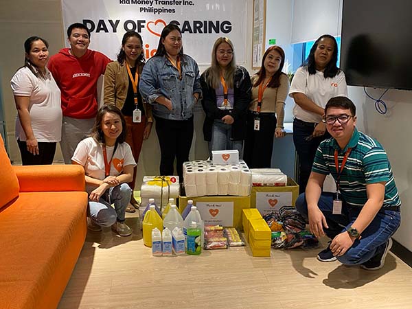 Ria employees donate cleaning products to school in the Philippines.